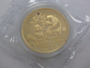 Chinese Gold Panda Coin Red Dot Discoloration Defect